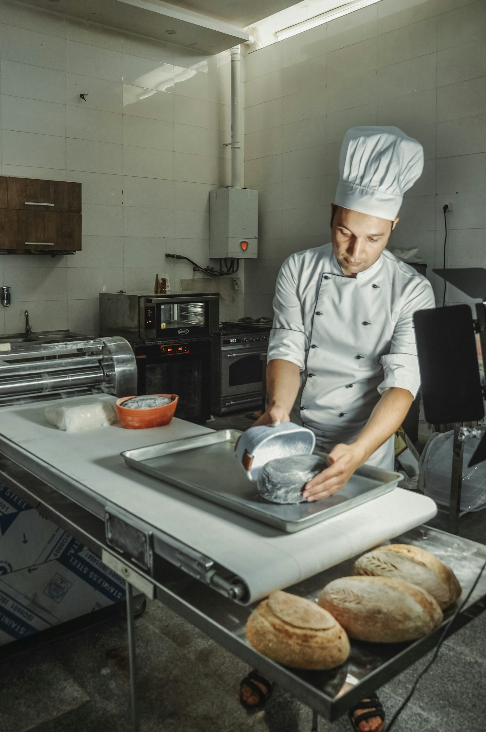 Professional bakery artisan in an Australian production facility